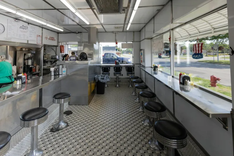 The Stool Where Everyone Knew Your Name: How America's Lunch Counters Built Communities Before Chains Tore Them Down